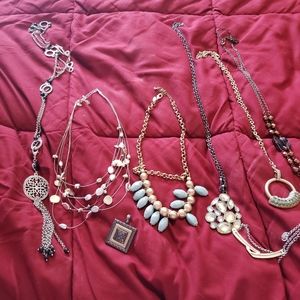 7 Lia Sophia necklaces plus pendant.